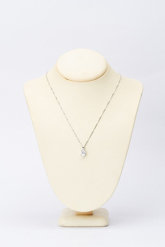 white gold pendant with a pear-shaped cut diamond on a white gold necklace