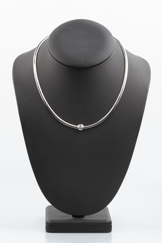 Gold Omega necklace with diamonds