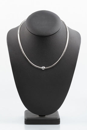 Gold Omega necklace with diamonds