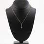White gold pendant with a brilliant on a white gold necklace