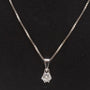 White gold solitaire pendant with a brilliant on a white gold necklace