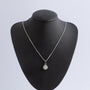 White gold double entourage pendant with diamonds on a white gold necklace
