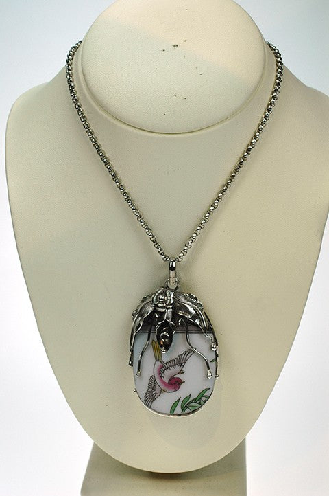 Zilveren hanger met Chinees porselein