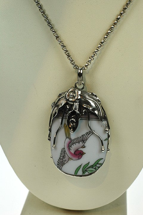 Zilveren hanger met Chinees porselein