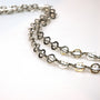 Long silver link necklace.