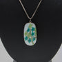 Silver pendant with porcelain