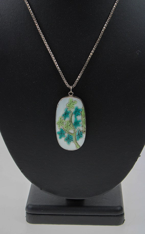 Silver pendant with porcelain