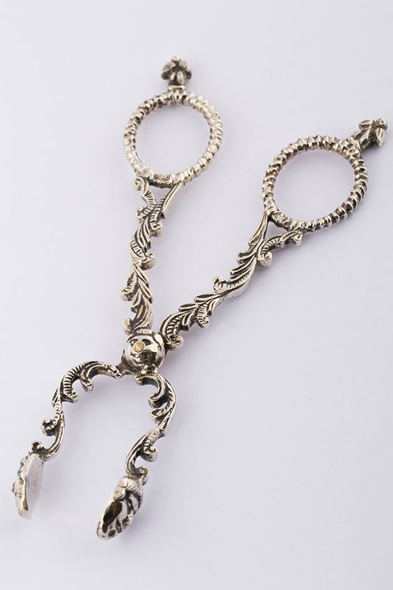 Antique silver diaper tongs