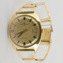 Gold Baume &amp; Mercier watch