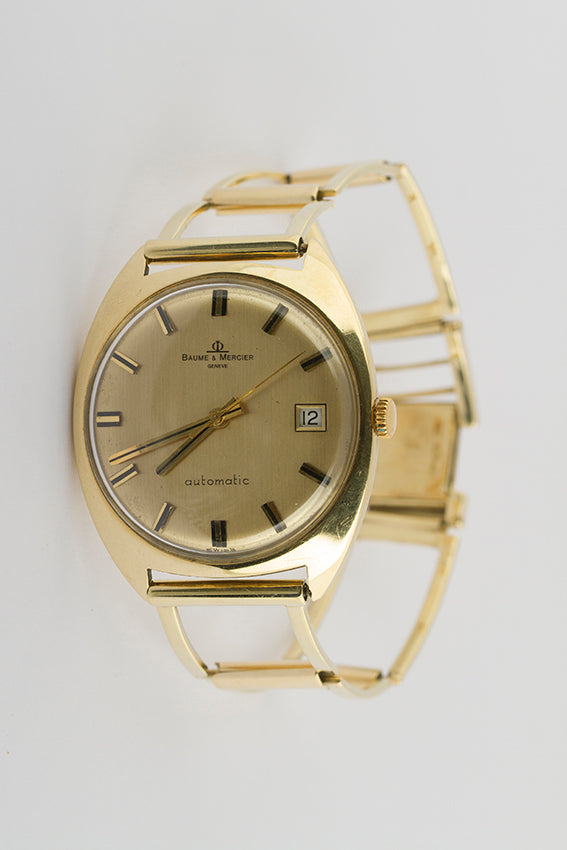 Gold Baume &amp; Mercier watch
