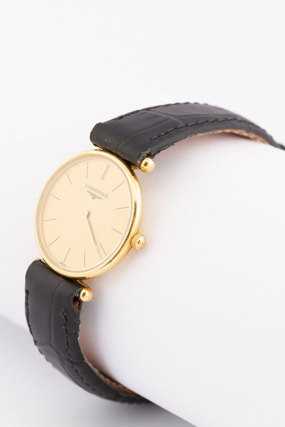 Gold Longines watch