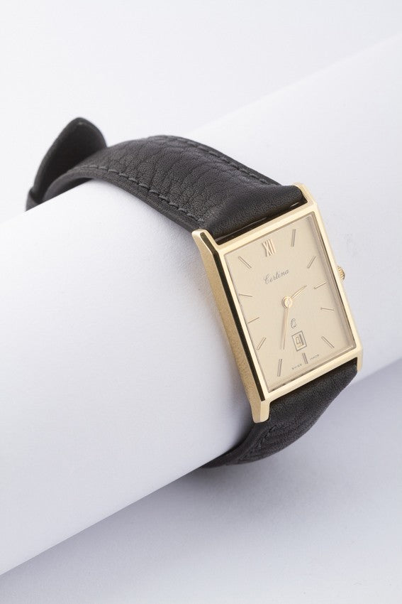 Gouden Certina horloge (quartz) aan lederen band