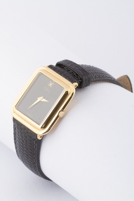Gold Ebel watch on leather strap