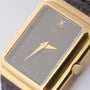 Gold Ebel watch on leather strap