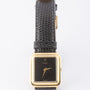 Gold Ebel watch on leather strap