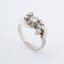Wit gouden ring met een briljant en 6 diamanten
