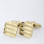 Gouden manchetknopen