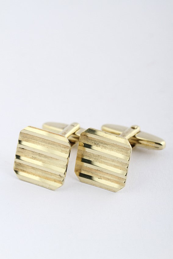 Gouden manchetknopen