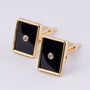 Gouden manchet knopen met onyx en briljant