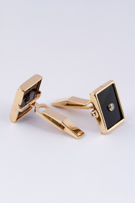 Gouden manchet knopen met onyx en briljant