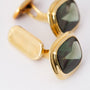 Gold cufflinks, each with a tourmaline