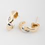White/yellow gold stud earrings with brilliant cut diamonds
