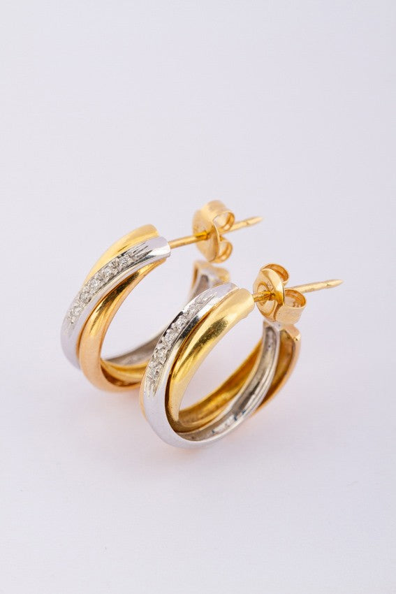 Gold earrings with diamonds