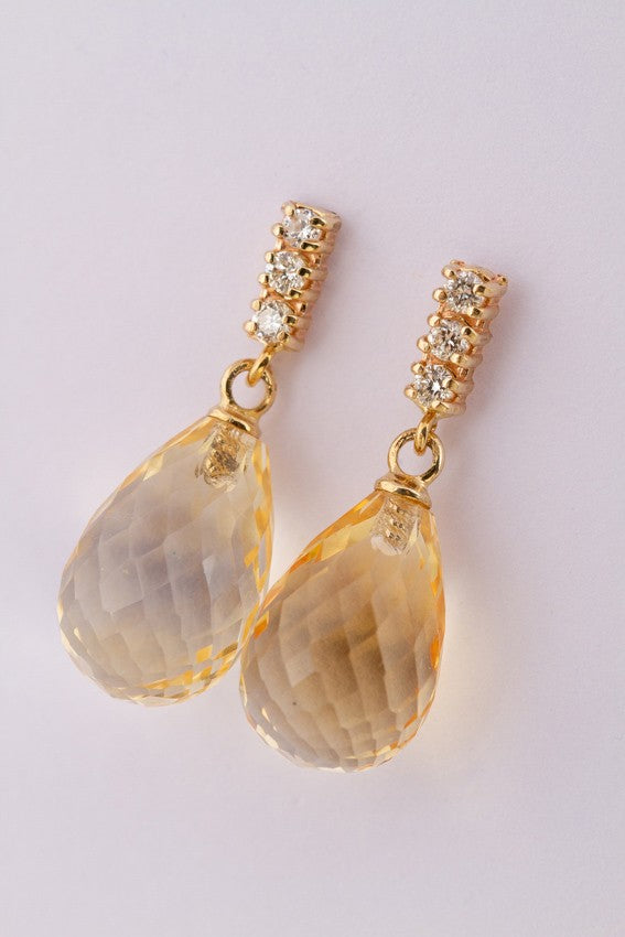 Gouden oorhangers met briolet gefacetteerde citrien