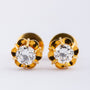 20 carat gold solitaire earrings, each with a brilliant
