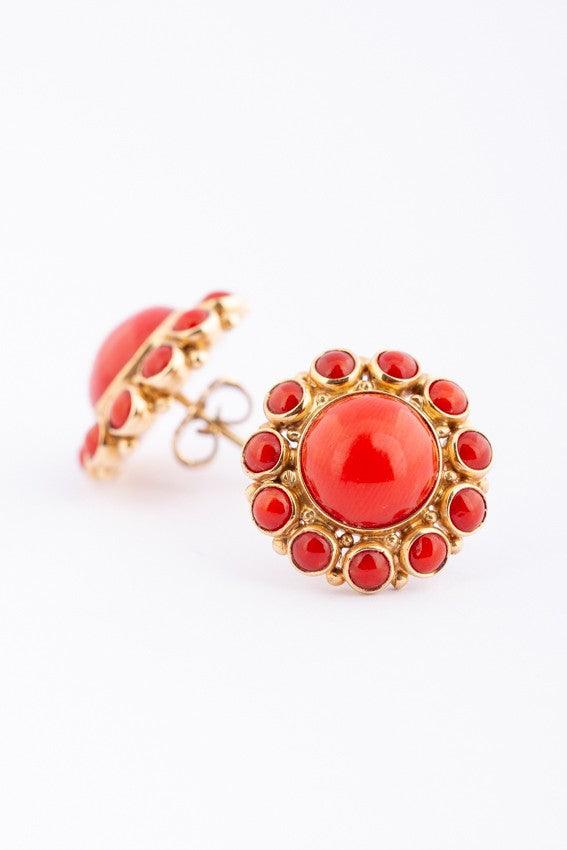Gold entourage stud earrings with red coral
