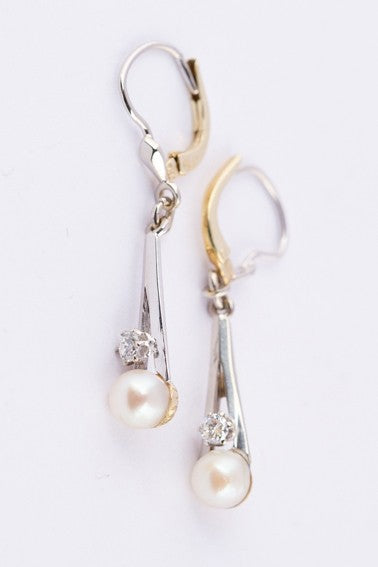 Wit/geel gouden oorhangers met een briljant en parel