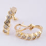 Gold stud earrings with 5 diamonds each