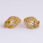 Pair of gold clip-on earrings