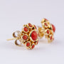 14 krt gouden oorknoppen met bloedkoralen