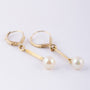 Earrings with a cultured pearl in each one