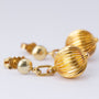 Gouden oorhangers met bol