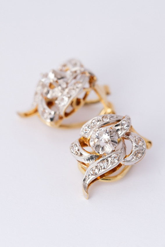 Gouden oorclips met witte spinel