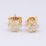Gouden entourage oorknoppen met briljanten