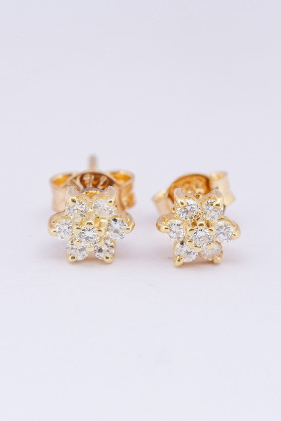 Gouden entourage oorknoppen met briljanten