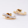White/yellow gold stud earrings with brilliant cut diamonds