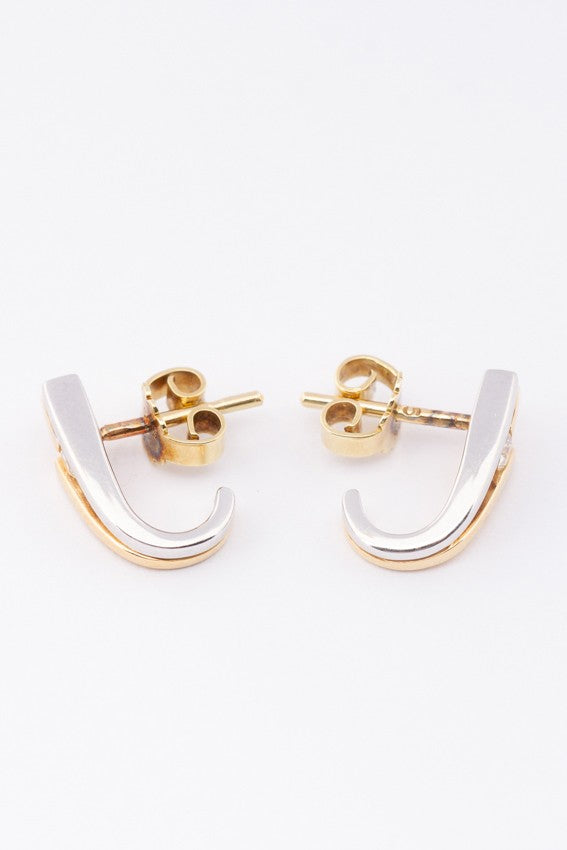 White/yellow gold stud earrings with brilliant cut diamonds