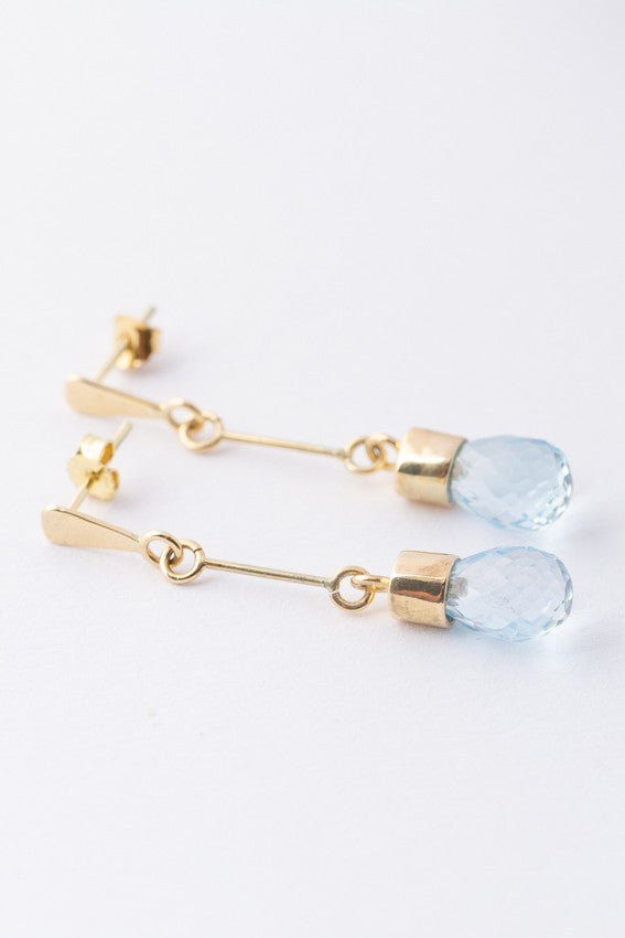 Gold earrings with topaz