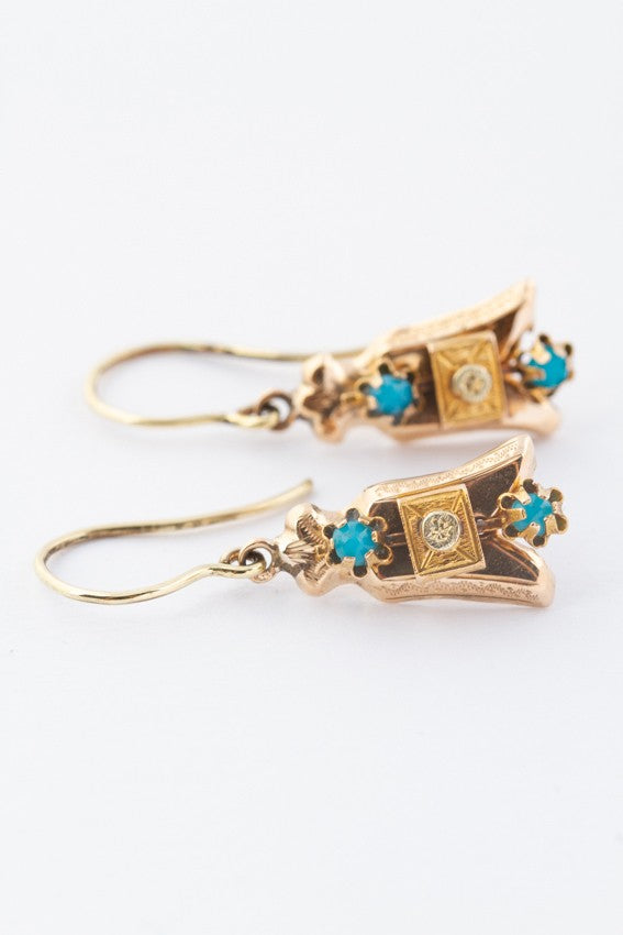 Pair of antique gold earrings with turquoise