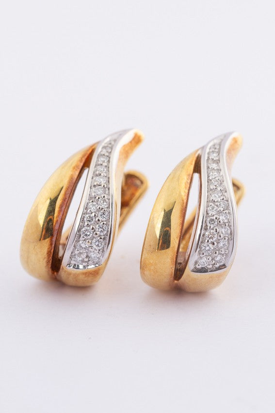 Gold earrings with 16 diamonds each