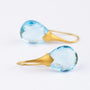 Gold earrings with briolette-cut topazes