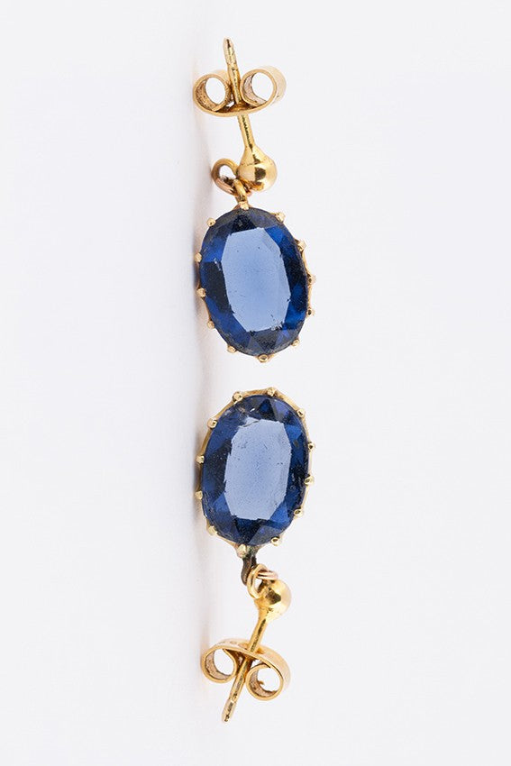 Gouden oorhangers met blauw kristal