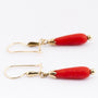 Gouden oorhangers met bloedkoraal