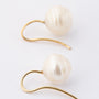 Gold earrings, each with a freshwater pearl