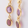 Gold earrings with various gemstones