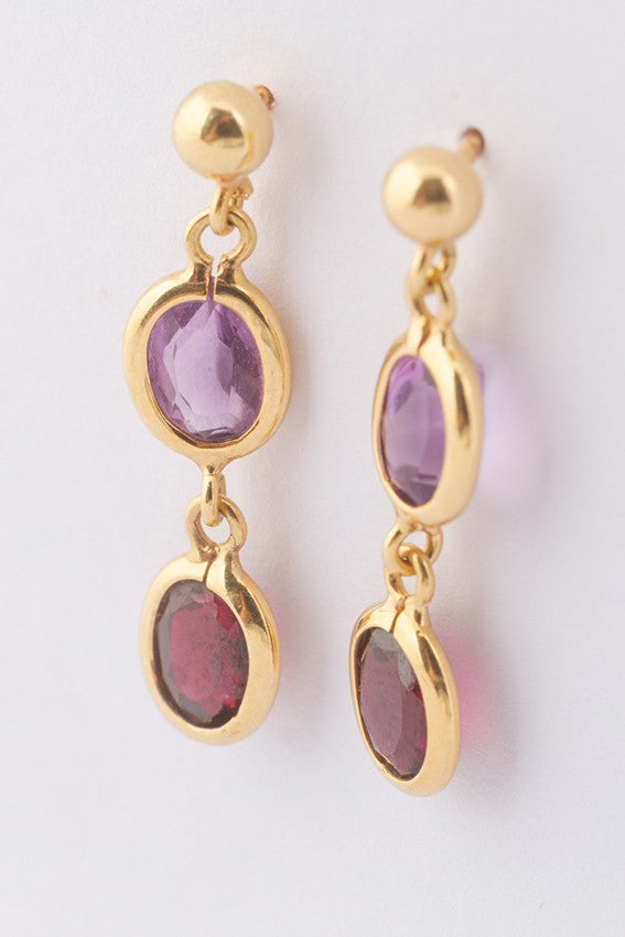 Gold earrings with various gemstones